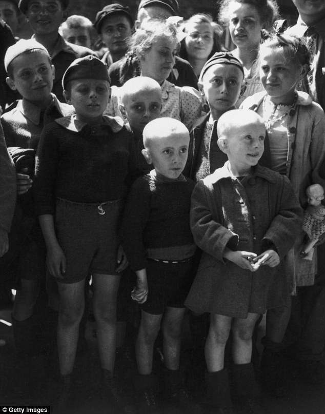 24843CA200000578-2903887-Bald_children_returned_from_the_Ravensbruck_concentration_camp_a-m-21_1420842547870